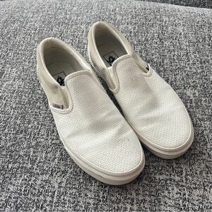 Vans white slip on sneakers